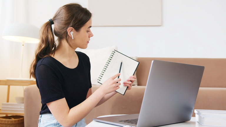 Woman talking to her therapist about relationship patterns over a video call