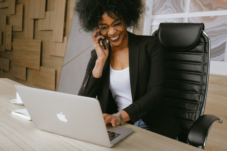 Woman talking with her integrative counsellor over a video call