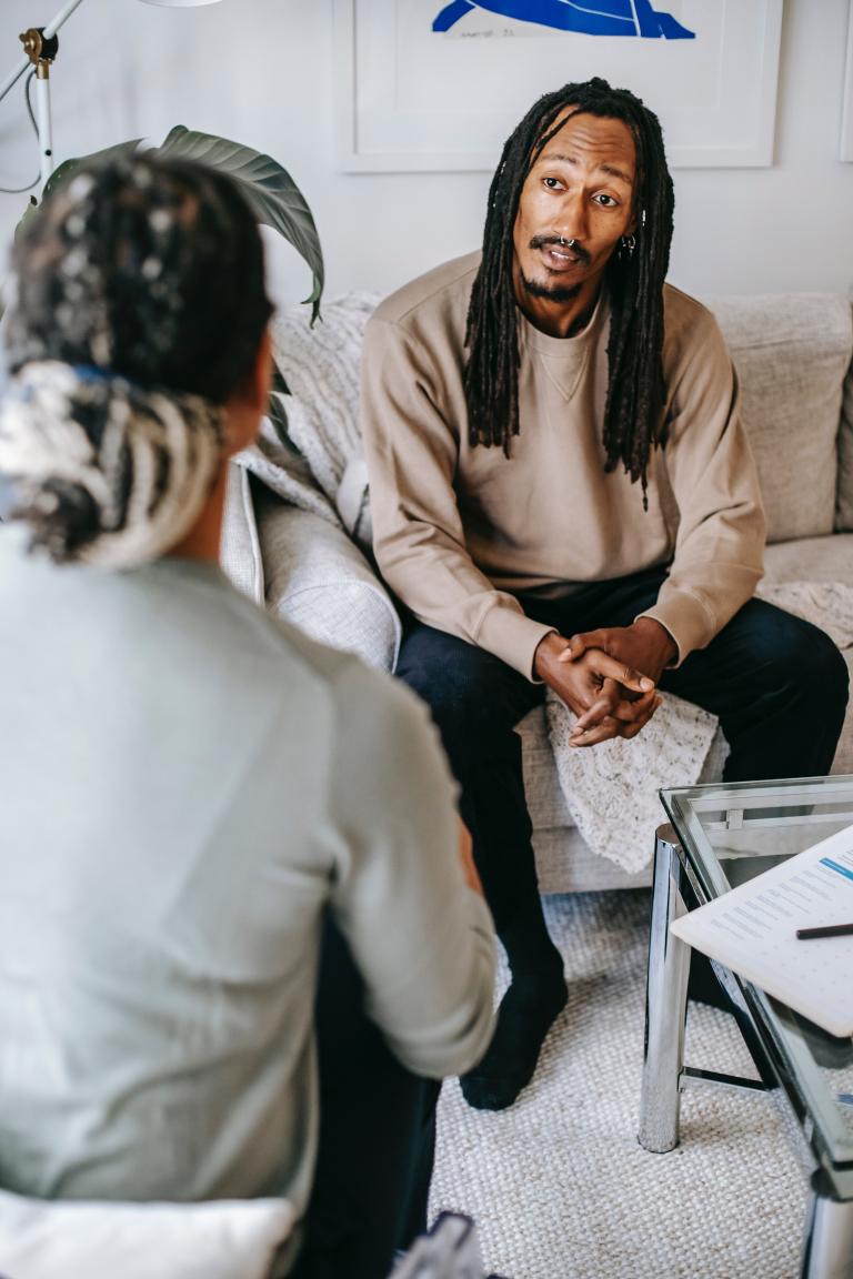 Couple having a calm conversation at home, reflecting transactional analysis ideas