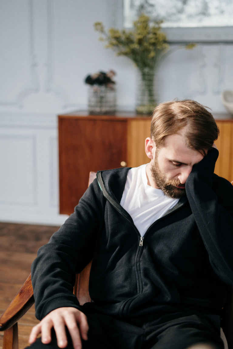 Young woman at home wondering what counselling is and whether it could help